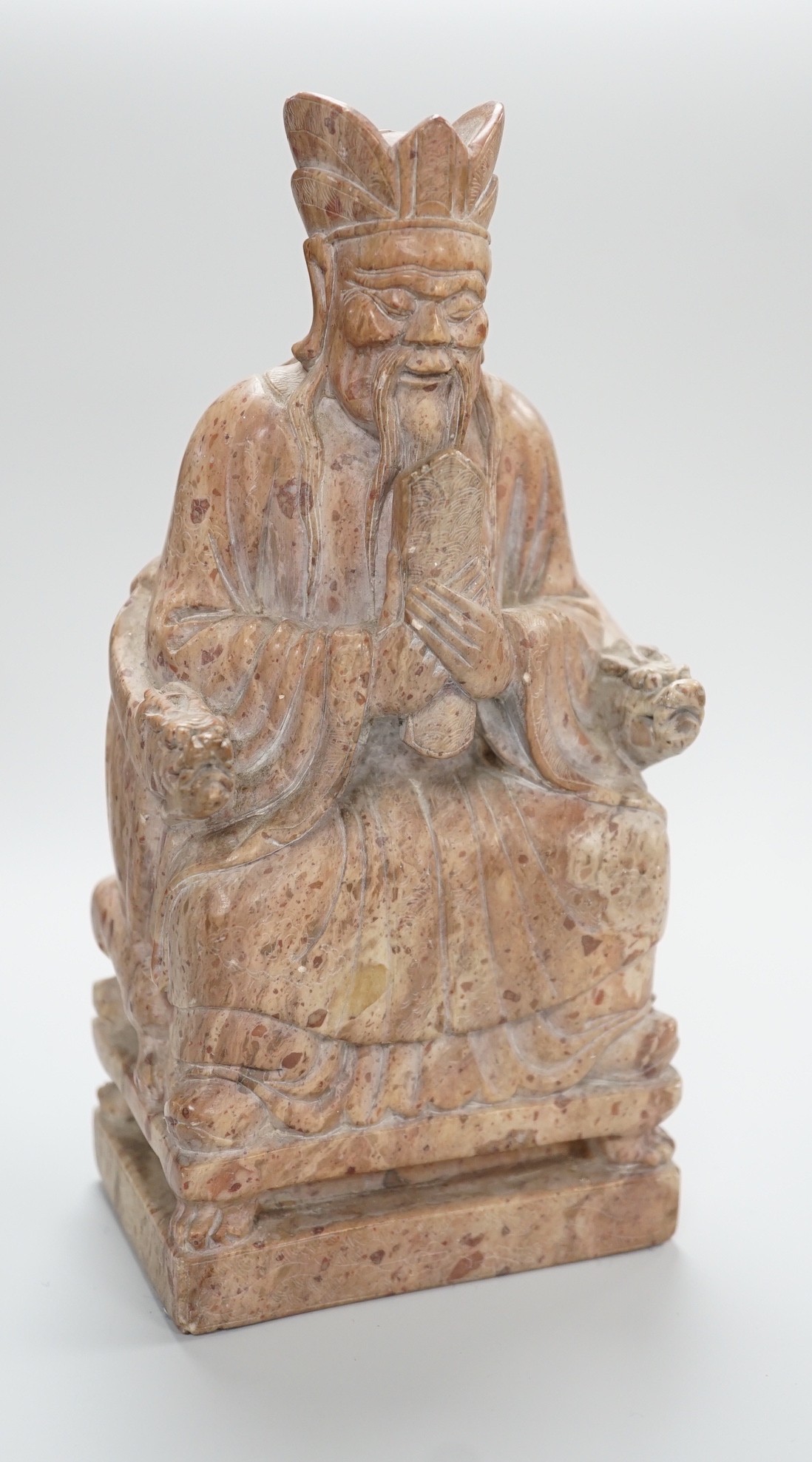 A Chinese soapstone seated figure of an Emperor, 19cm tall